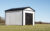 White-Storage-Shed-With-Closed-Rampage-Door