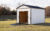 White-Storage-Shed-With-Opened-Rampage-Door